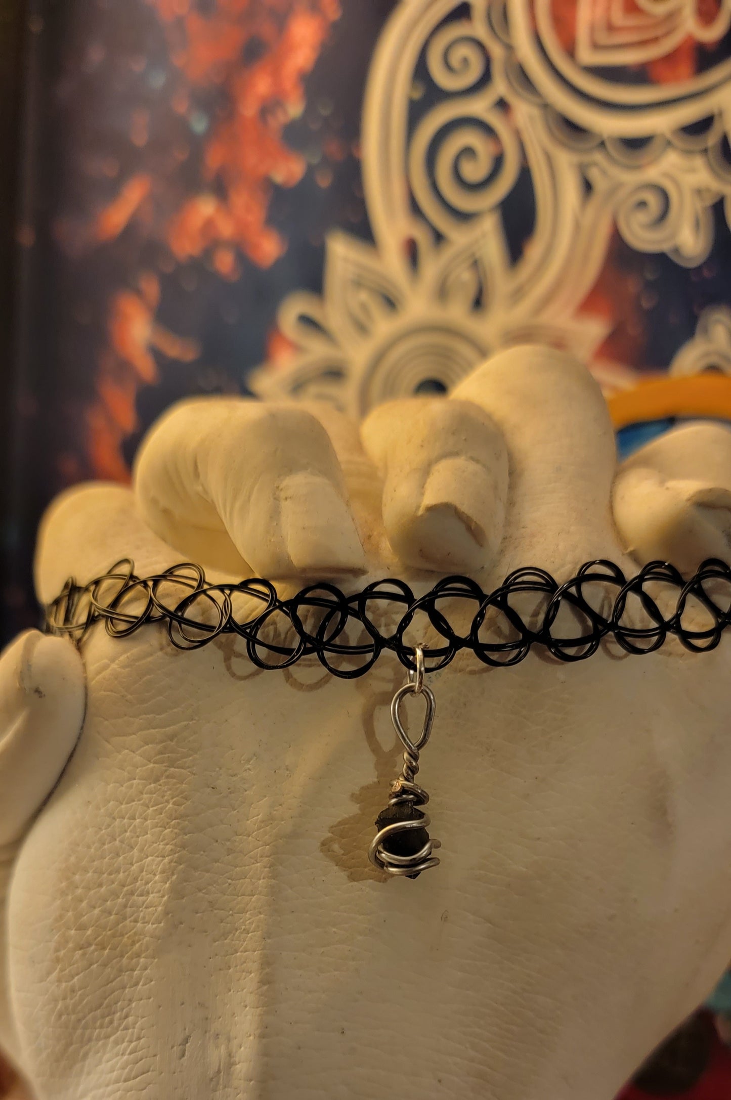 Black necklace with moldavite